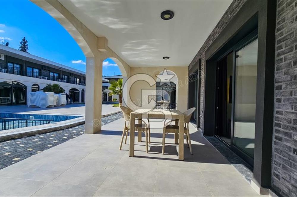 KUŞADASI KUŞTUR MAH. GENİŞ BAHÇE PAYI OLAN EŞYALI 1+1 RESİDENCE 