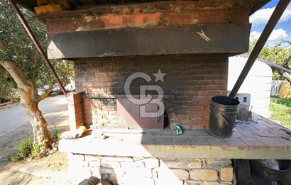 İzmir Tire Anayolu kenarında Satılık 40.000 m² Müştemilatlı Tarla