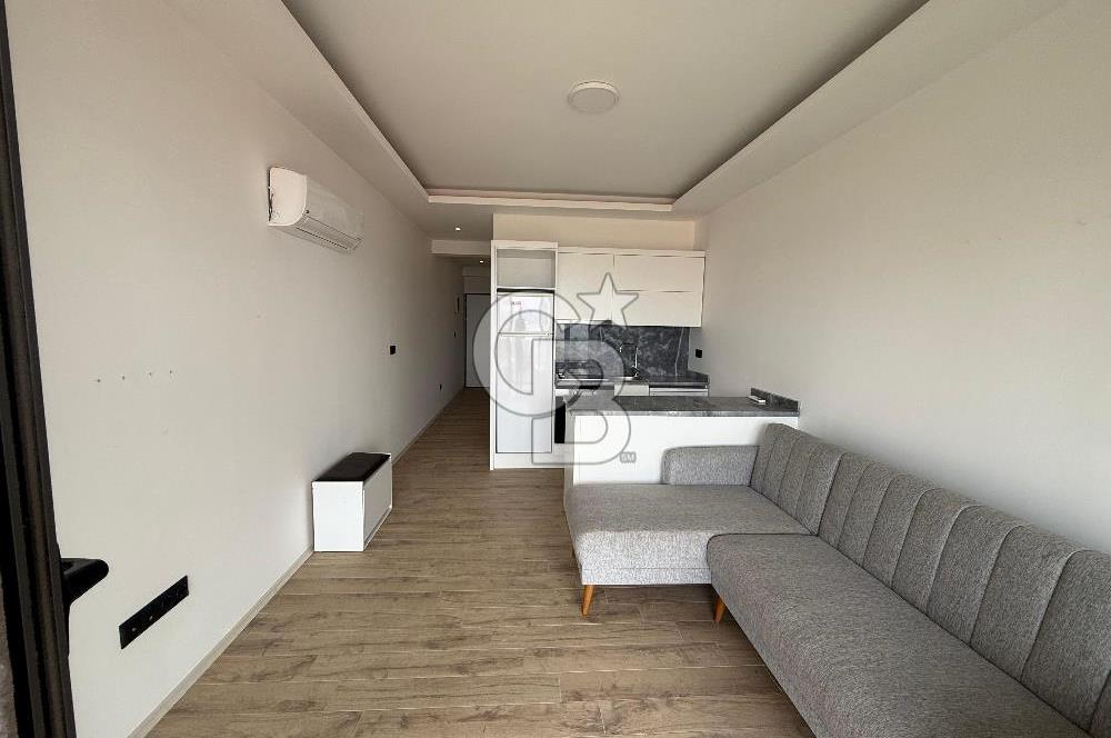 Çeşme'de Denize Sıfır Özel Plajlı ve Havuzlu 1+1 Daire