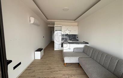 Çeşme'de Denize Sıfır Özel Plajlı ve Havuzlu 1+1 Daire