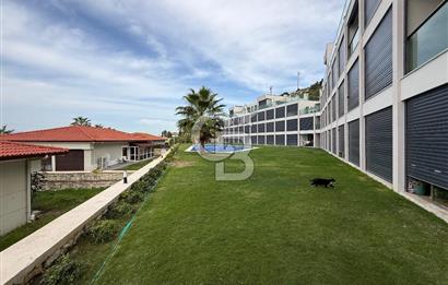 Çeşme'de Denize Sıfır Özel Plajlı ve Havuzlu 1+1 Daire