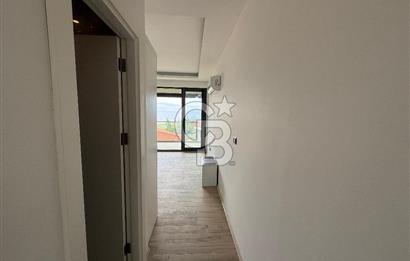 Çeşme'de Denize Sıfır Özel Plajlı ve Havuzlu 1+1 Daire