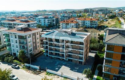 İZMİR SEFERİHİSAR CAMİKEBİR MAHALLESİ – ANA CADDE ÜZERİNDE YENİ SIFIR 2+1 DAİRE