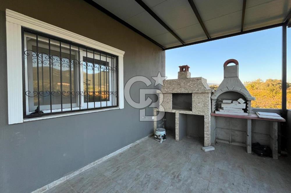 TORBALIDA İÇERİSİNDE EV OLAN MÜSTAKİL ARSA