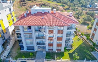 Kuşadasında Hem Yatırım Hem Oturum İçin İdeal Satılık 3+1 Daire