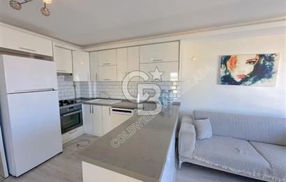 Kuşadasında Hem Yatırım Hem Oturum İçin İdeal Satılık 3+1 Daire