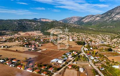 KORKUTELİ BAYAT BADEMLERDE İMAR SINIRINA KOMŞU 5000M2 YATIRIM !
