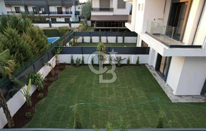 MENDERES COLDWELL BANKER POYRAZ'DAN GENİŞ BAHÇELİ MODERN VİLLA..