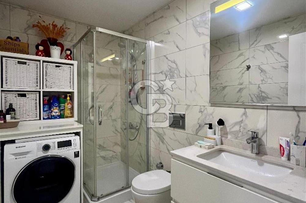 Dekon Suadiye Ametist'te havuz ve yeşilliklere bakan daire.