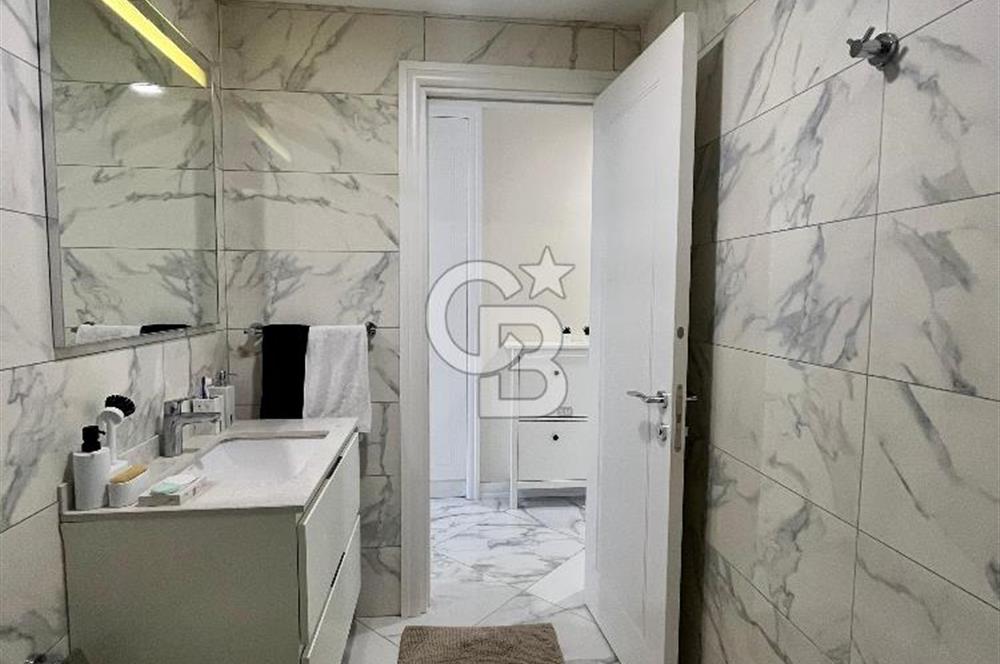 Dekon Suadiye Ametist'te havuz ve yeşilliklere bakan daire.