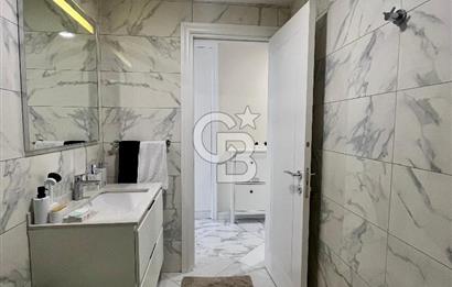 Dekon Suadiye Ametist'te havuz ve yeşilliklere bakan daire.