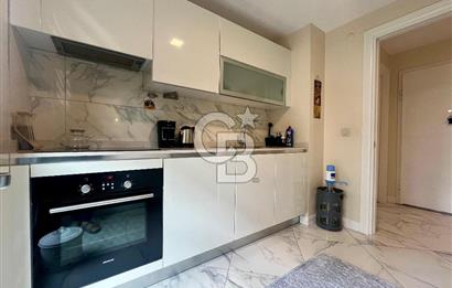 Dekon Suadiye Ametist'te havuz ve yeşilliklere bakan daire.