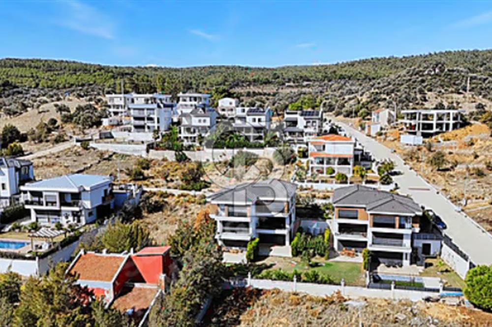 GÜZELBAHÇE ÇAMLIDA ANA YOLA YAKIN ÖNÜ AÇIK FIRSAT ARSA