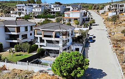 GÜZELBAHÇE ÇAMLIDA ANA YOLA YAKIN ÖNÜ AÇIK FIRSAT ARSA