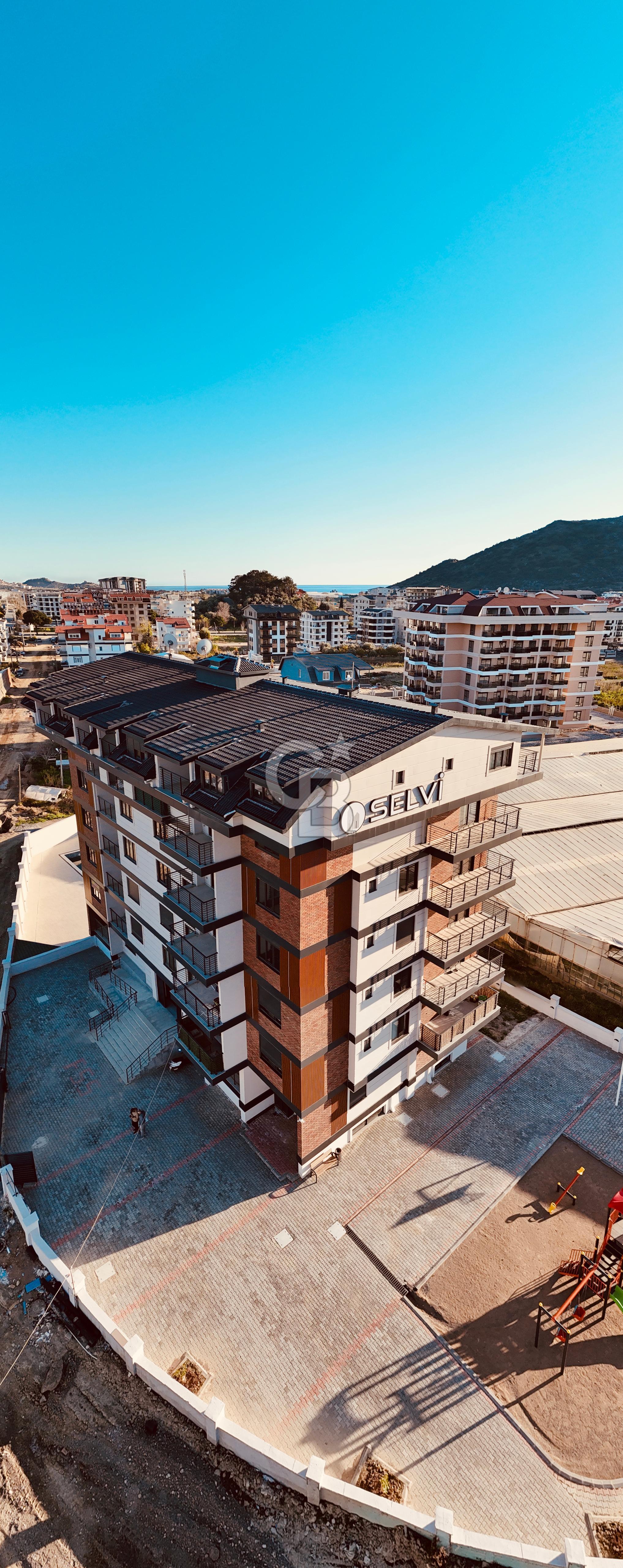 GAZİPAŞA PAZARCI DA DENİZE 1KM 1+1 FULL YAPILI SATILIK DAİRELER