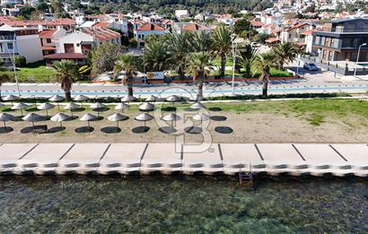  İzmir Yeni Foça'da denize sıfır eşsiz konumda otel arsası hissesi..