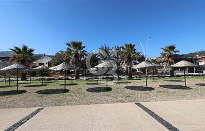  İzmir Yeni Foça'da denize sıfır eşsiz konumda otel arsası hissesi..