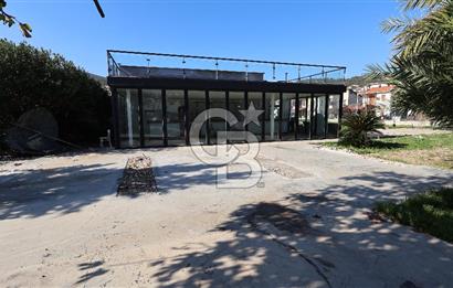  İzmir Yeni Foça'da denize sıfır eşsiz konumda otel arsası hissesi..