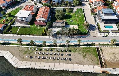  İzmir Yeni Foça'da denize sıfır eşsiz konumda otel arsası hissesi..