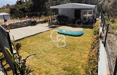 Bornova Yakaköy'de Doğa İle İç içe Satılık Tarla ve Ev