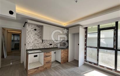 Bayraklı körfez Mahallesi’nde satılık 2 + 1 daire