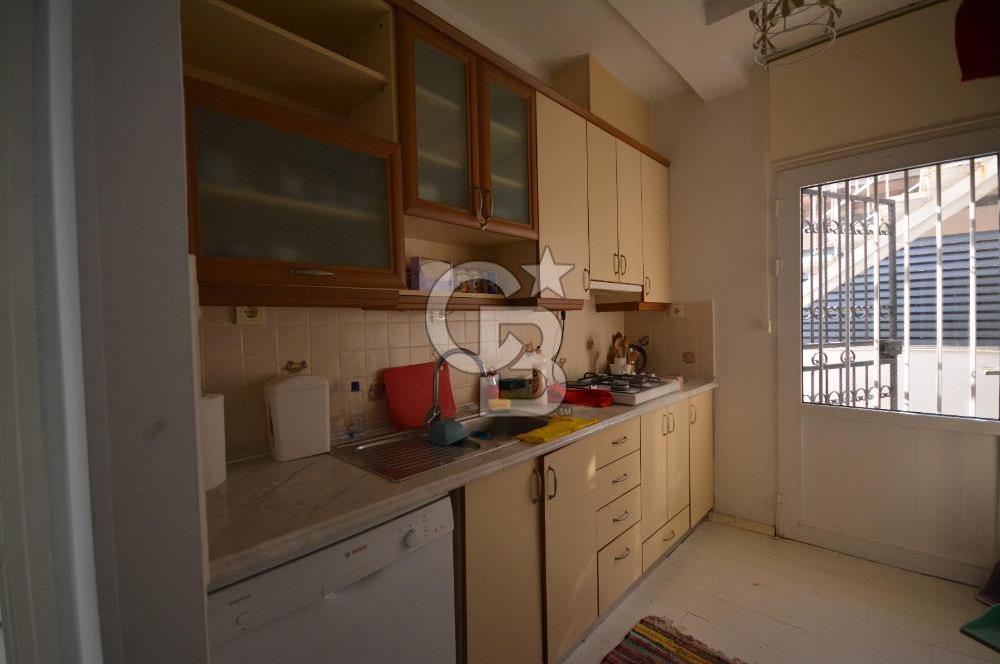 Çeşme Ilıca Şantiye Evlerinde Satılık Bahçe Katı 2+1