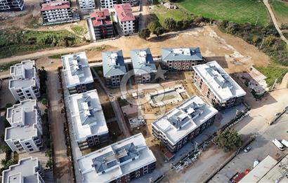 Torbalı Kipa'ya komşu havuzlu güvenlikli sitede sıfır 2+1..