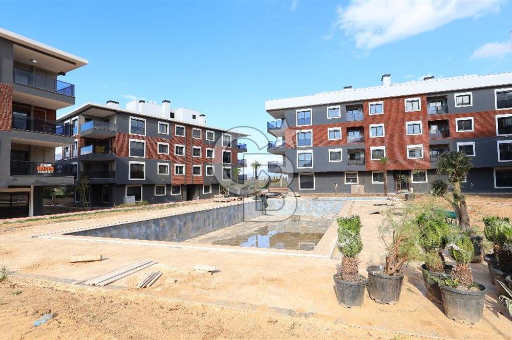 Torbalı Kipa'ya komşu havuzlu güvenlikli sitede sıfır 2+1..