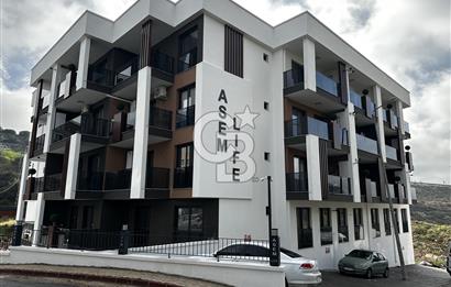 BUCA ASEM LİFE SİTESİNDE BAHÇELİ SATILIK 1+1 DAİRE