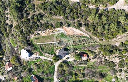 AHMETBEYLİ’DE DENİZE YAKIN, TARİHİ DOKU İÇİNDE, NUMARATAJLI YATIRIMLIK ARAZİ