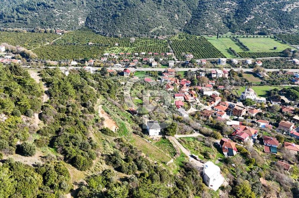 AHMETBEYLİ’DE DENİZE YAKIN, TARİHİ DOKU İÇİNDE, NUMARATAJLI YATIRIMLIK ARAZİ