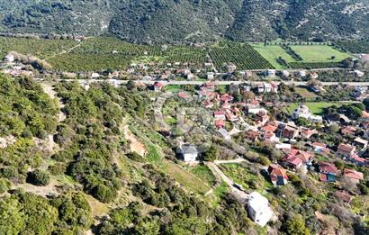 AHMETBEYLİ’DE DENİZE YAKIN, TARİHİ DOKU İÇİNDE, NUMARATAJLI YATIRIMLIK ARAZİ