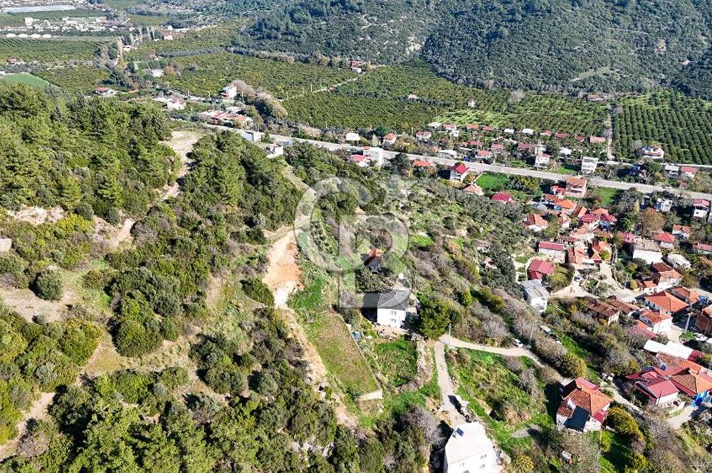 AHMETBEYLİ’DE DENİZE YAKIN, TARİHİ DOKU İÇİNDE, NUMARATAJLI YATIRIMLIK ARAZİ