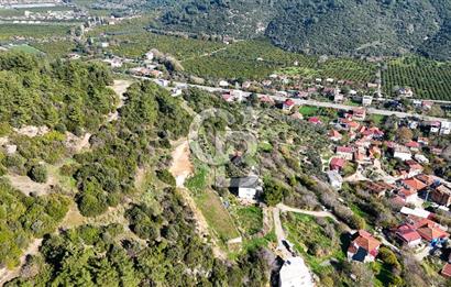 AHMETBEYLİ’DE DENİZE YAKIN, TARİHİ DOKU İÇİNDE, NUMARATAJLI YATIRIMLIK ARAZİ