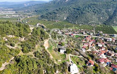 AHMETBEYLİ’DE DENİZE YAKIN, TARİHİ DOKU İÇİNDE, NUMARATAJLI YATIRIMLIK ARAZİ