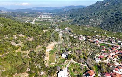 AHMETBEYLİ’DE DENİZE YAKIN, TARİHİ DOKU İÇİNDE, NUMARATAJLI YATIRIMLIK ARAZİ