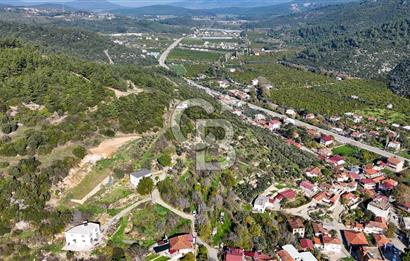 AHMETBEYLİ’DE DENİZE YAKIN, TARİHİ DOKU İÇİNDE, NUMARATAJLI YATIRIMLIK ARAZİ