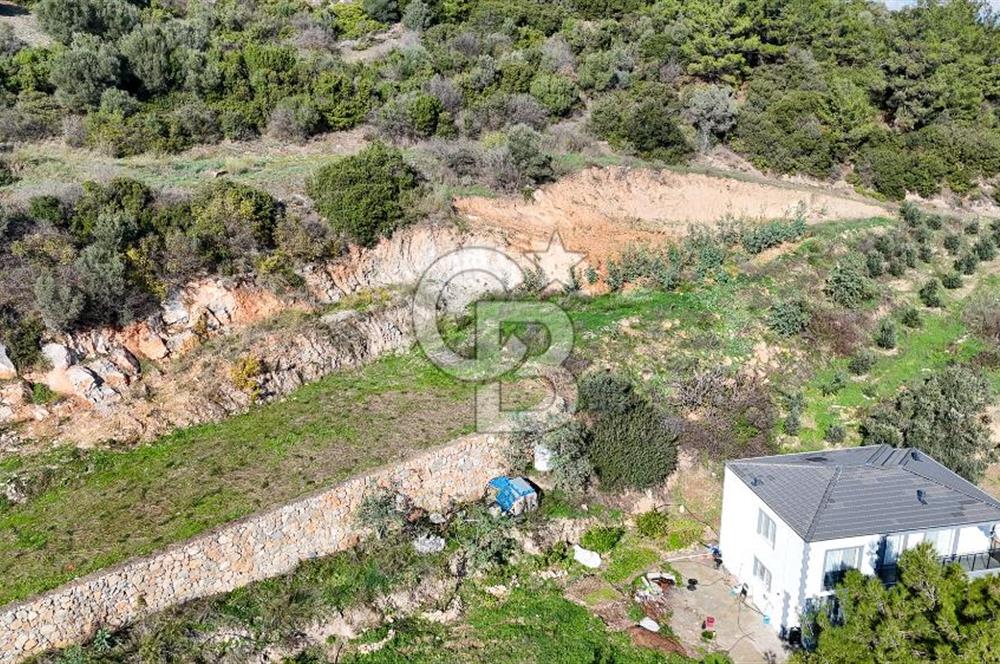 AHMETBEYLİ’DE DENİZE YAKIN, TARİHİ DOKU İÇİNDE, NUMARATAJLI YATIRIMLIK ARAZİ
