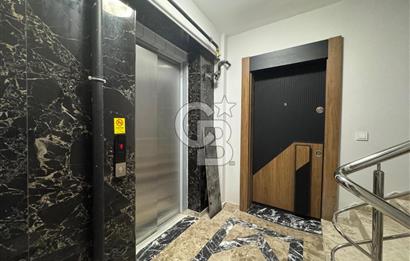 BOSTANLI'DA, YENİ BİNADA, ARA KAT, YENİ EŞYALI KİRALIK 2+1 DAİRE