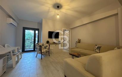 BOSTANLI'DA, YENİ BİNADA, ARA KAT, YENİ EŞYALI KİRALIK 2+1 DAİRE