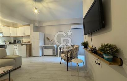 BOSTANLI'DA, YENİ BİNADA, ARA KAT, YENİ EŞYALI KİRALIK 2+1 DAİRE