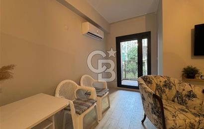 BOSTANLI'DA, YENİ BİNADA, ARA KAT, YENİ EŞYALI KİRALIK 2+1 DAİRE