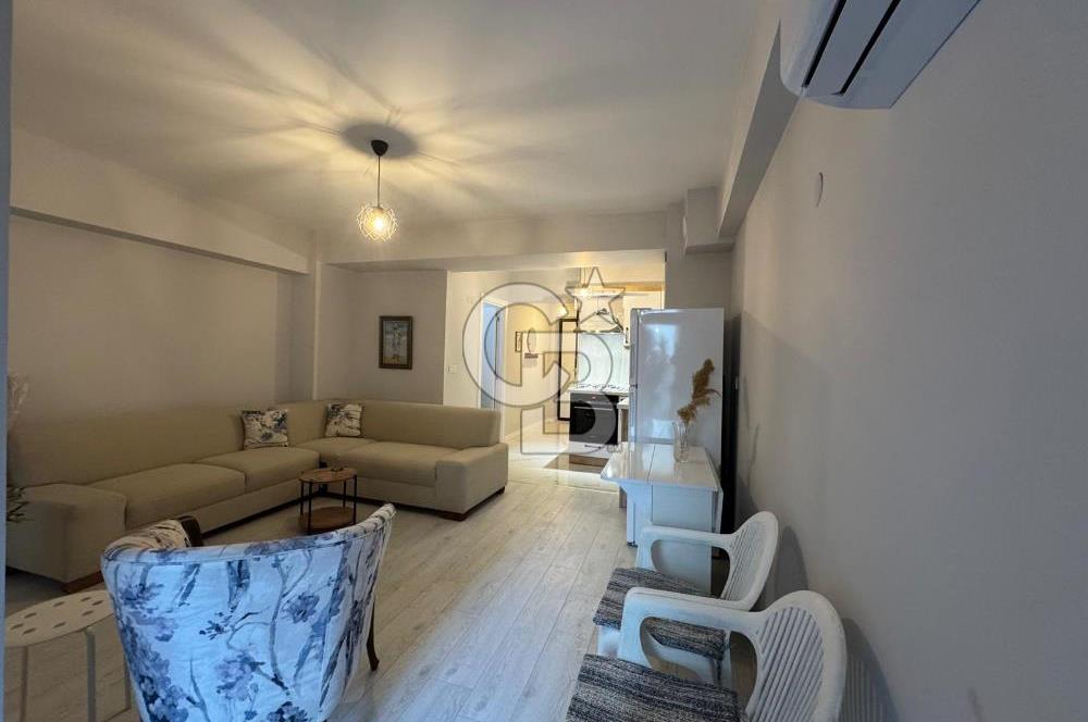 BOSTANLI'DA, YENİ BİNADA, ARA KAT, YENİ EŞYALI KİRALIK 2+1 DAİRE