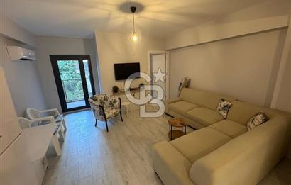 BOSTANLI'DA, YENİ BİNADA, ARA KAT, YENİ EŞYALI KİRALIK 2+1 DAİRE