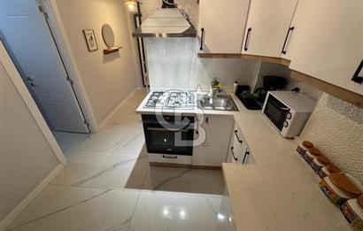 BOSTANLI'DA, YENİ BİNADA, ARA KAT, YENİ EŞYALI KİRALIK 2+1 DAİRE