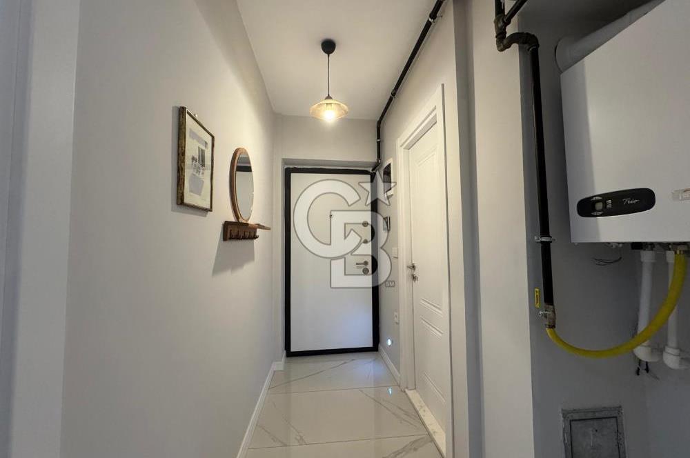 BOSTANLI'DA, YENİ BİNADA, ARA KAT, YENİ EŞYALI KİRALIK 2+1 DAİRE