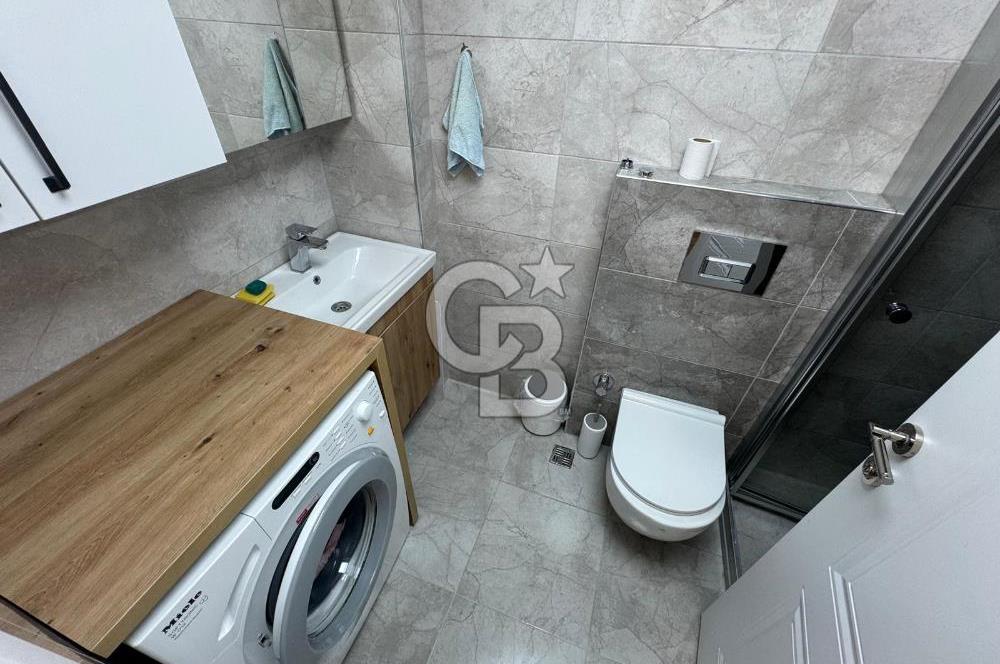 BOSTANLI'DA, YENİ BİNADA, ARA KAT, YENİ EŞYALI KİRALIK 2+1 DAİRE