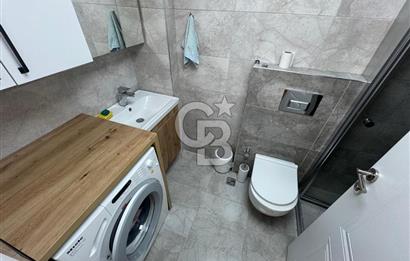 BOSTANLI'DA, YENİ BİNADA, ARA KAT, YENİ EŞYALI KİRALIK 2+1 DAİRE