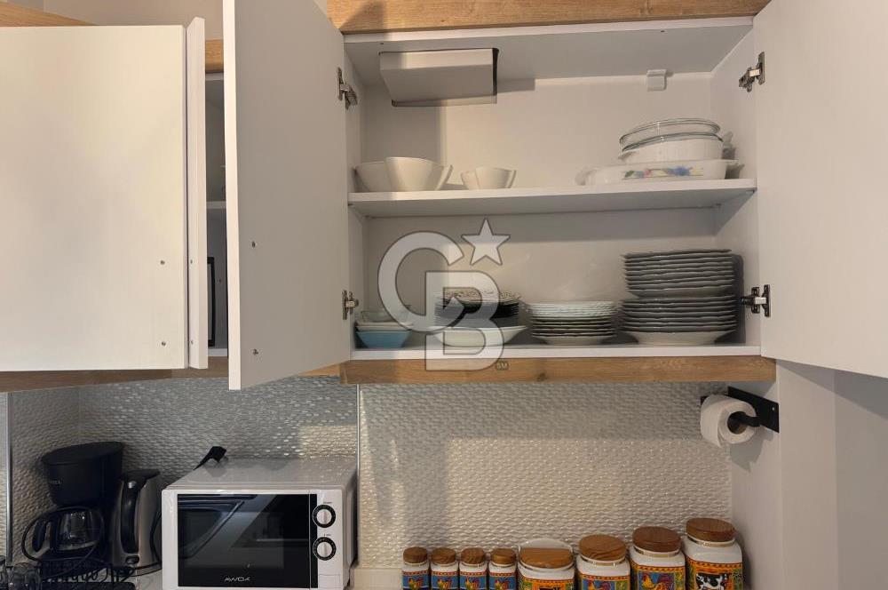 BOSTANLI'DA, YENİ BİNADA, ARA KAT, YENİ EŞYALI KİRALIK 2+1 DAİRE