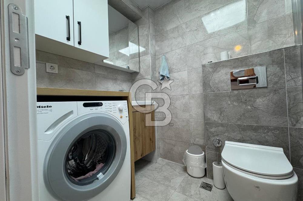 BOSTANLI'DA, YENİ BİNADA, ARA KAT, YENİ EŞYALI KİRALIK 2+1 DAİRE